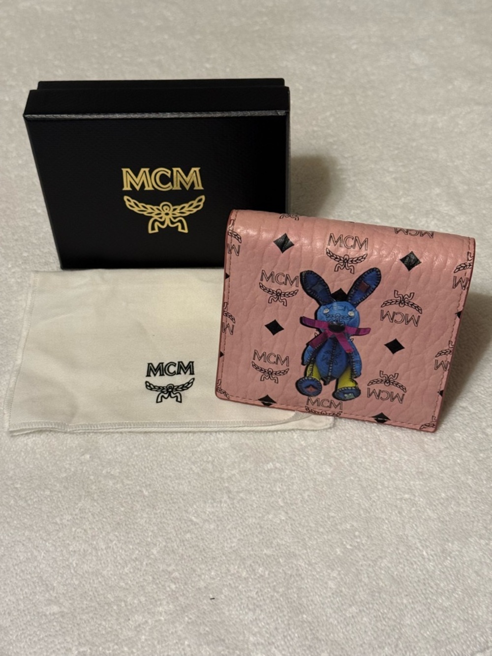 MCM Pink Logo Leather Bi-Fold Wallet with Blue Bunny Motif